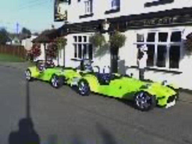 both cars outside pub